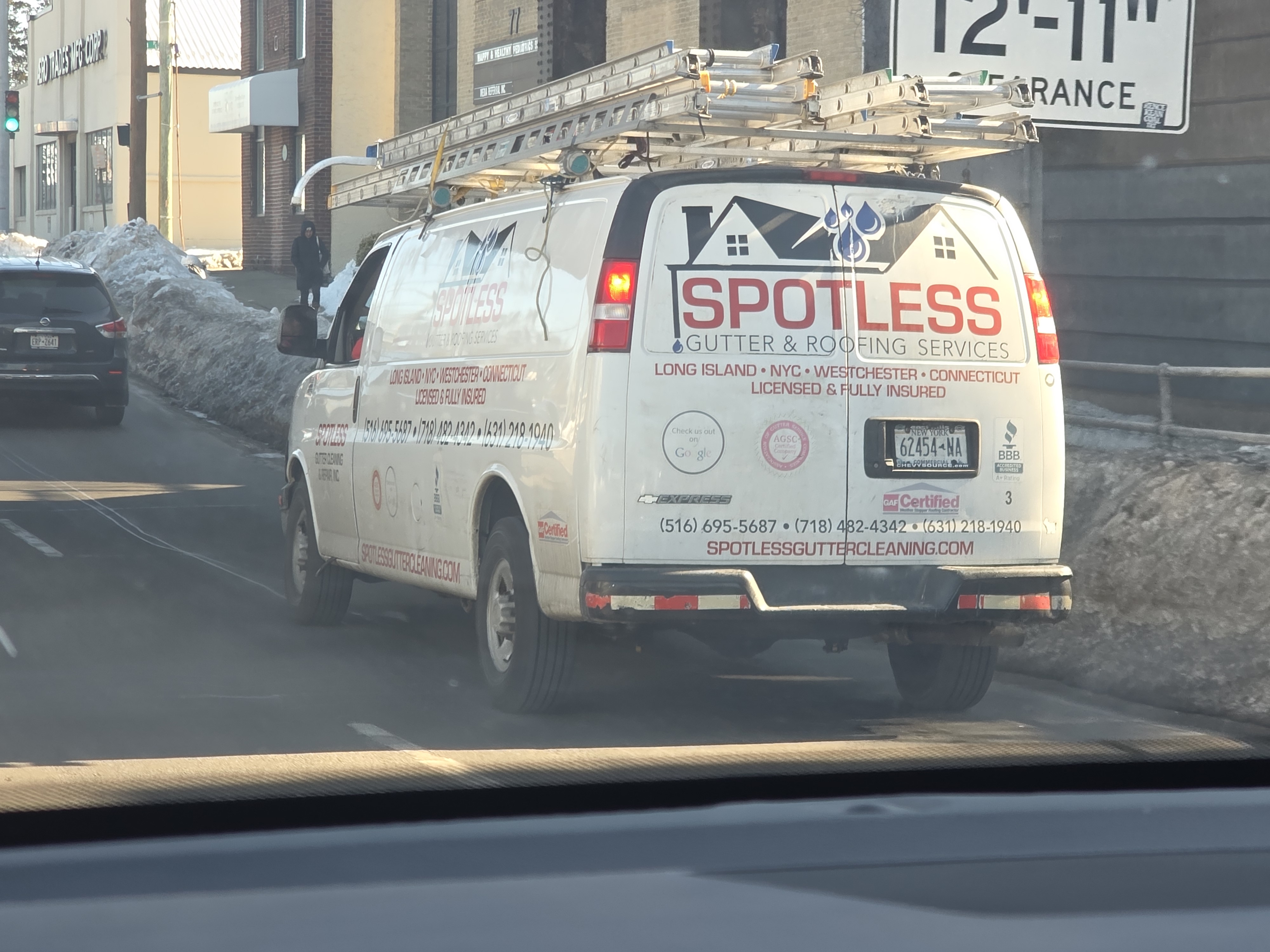 Spotless Gutter & Roofing Services logo