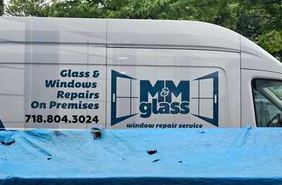 J&M Home Improvements logo