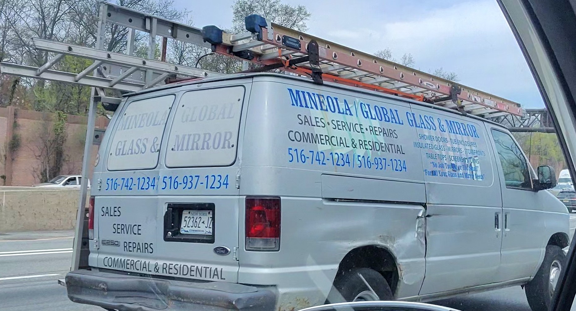 Mineola Global Glass & Mirror logo